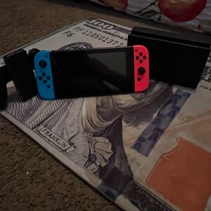 Blue and Red Gaming Console with Accessories